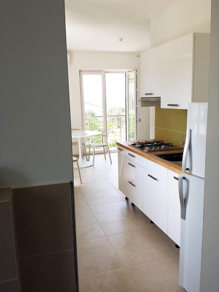 Hotel E Residence Il Faro Аччароли Экстерьер фото