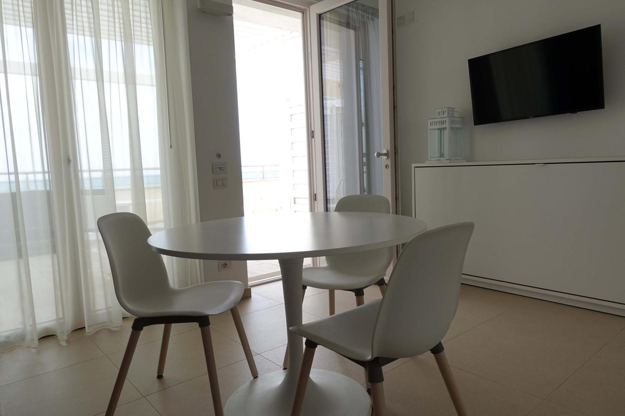 Hotel E Residence Il Faro Аччароли Экстерьер фото